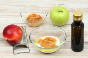ingredients-easy-homemade-facial-mask-wooden-background-face-mask-apple-fat-cream-olive-oil-139051463