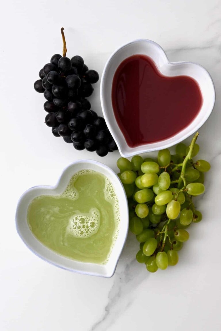 How-to-Make-Grape-Juice-Black-grapes-a-bowl-of-red-grape-juice-a-bowl-of-green-grape-juice-and-green-grapes